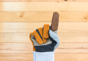 Hand in rough leather glove