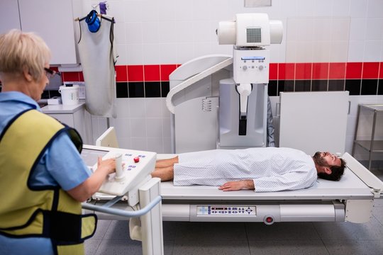Male patient going through x-ray test