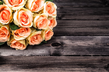 Valentines day roses, bouquet on wooden background
