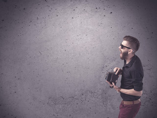 Hipster guy with vintage camera and beard