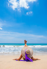 Woman in bikini at tropical beach