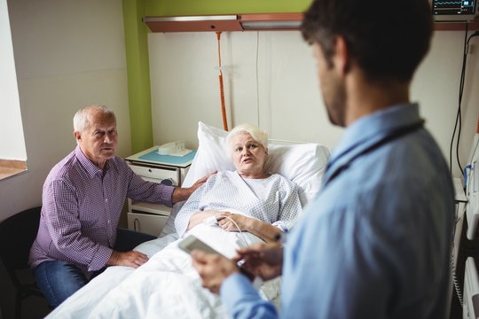 Patient interacting with doctor in hospital