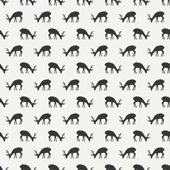 Tribal ethnic seamless pattern with deer. Reindeer. Wrapping paper. Scrapbook. Vintage decorations tiling. Native vector illustration. Vintage background. Graphic texture. Winter Christmas pattern.