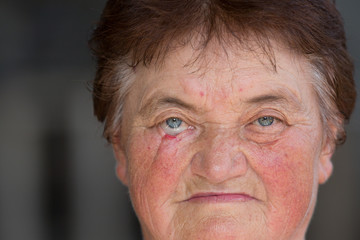 Portrait of a retired woman, sick old woman