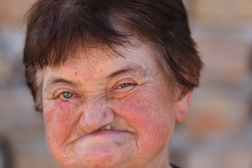 Portrait of a retired woman, sick old woman