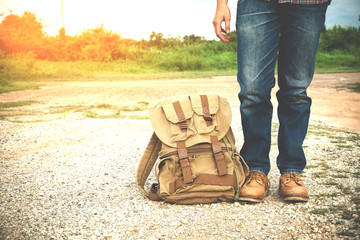Young man traveler with backpack travel concept
