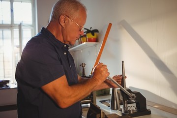 Goldsmith using mini drill press
