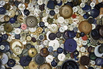 An Assortment of Old Vintage Buttons in Various Sizes