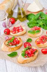 Bruschetta with tomato, onion and fresh basil