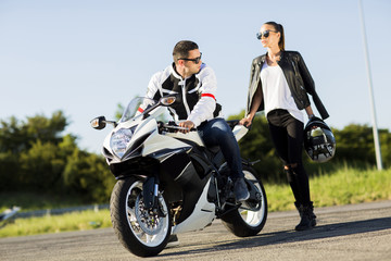 Fototapeta na wymiar Couple on motorcycle