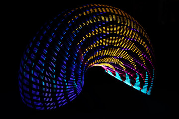 LED light painting in dark, long exposure - Powered by Adobe