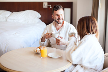 Obraz na płótnie Canvas Couple having coffee in the morning