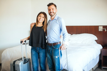 Newlyweds arriving to their hotel room