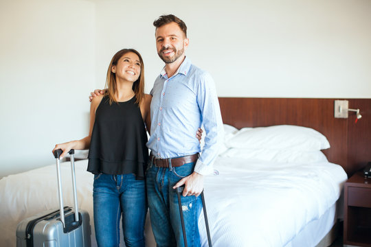 Young couple on a hotel room