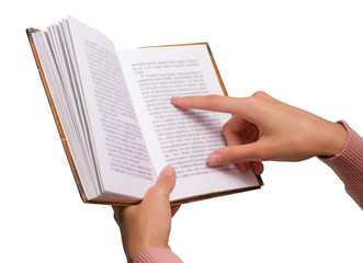 Isolated Female Hands holding a Vintage Book, pointing on a Word
