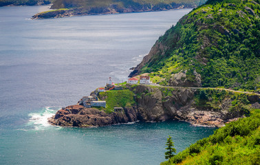 Fort Amherst, rugged coastline and Atlantic ocean. Warm summer day in August with views from atop the Historically famous Signal Hill in St. John's. - 119703860