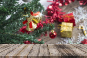 Fototapeta na wymiar Christmas holiday background with empty wooden deck table over w
