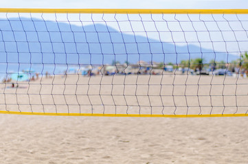 Beach volleyball net on the beach close