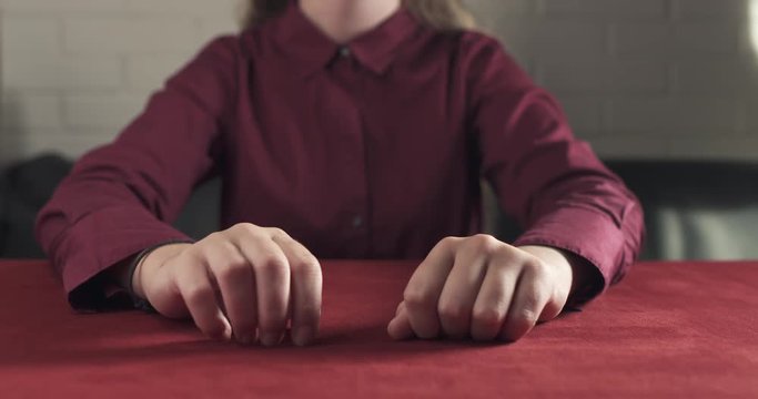 female teen girl finger tapping in slow motion thinking about something or bored