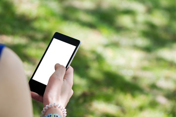 Young brunette woman with mobile in your hands