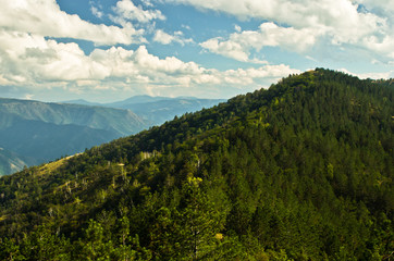 Fototapeta na wymiar Landscape and cloudscape of Troglav mountain at late summer, west Serbia