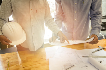 architect point at blueprint, architectural concept