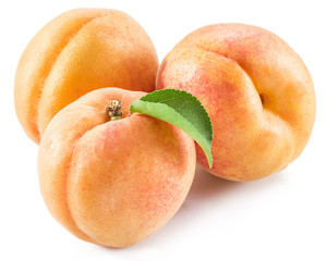 Apricot fruit with leaves on the white background.