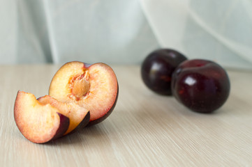 Ripe plums on a table