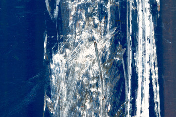 A background of peeling paint and rusty old metal