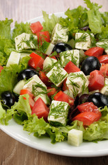 Vegetable salad with feta and olives