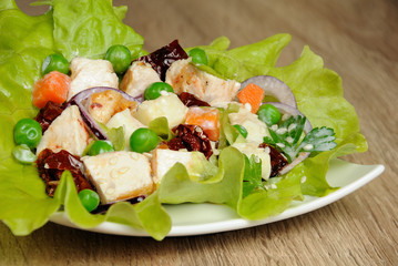 A portion of salad in lettuce leaves