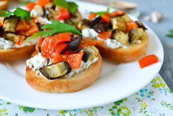 bruschetta with mascarpone, pepper and eggplant grilled