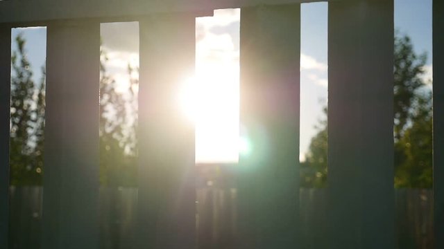 fence silhouette sunlight video glare the movement