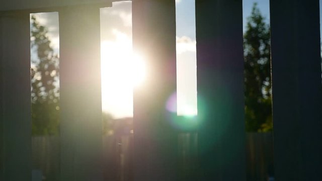 fence silhouette sunlight glare the movement video
