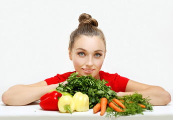 Woman with vegetable groceries .