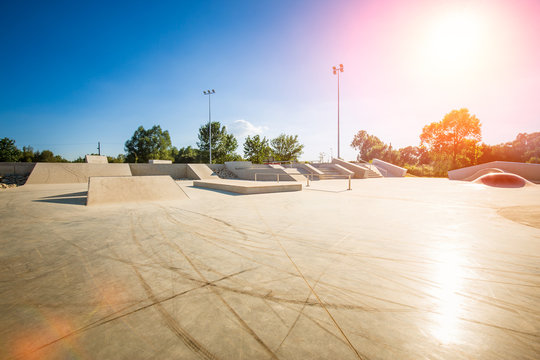 Skate Park in the daytime. Urban design concrete skatepark.