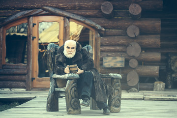 bearded cook with wooden cup
