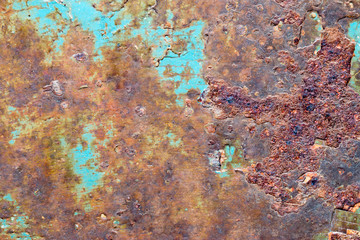 A background of peeling paint and rusty old metal