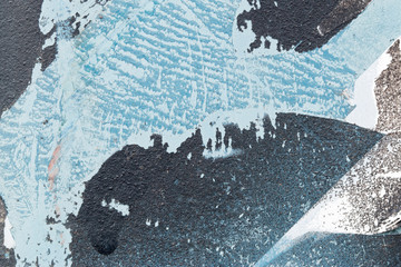 A background of peeling paint and rusty old metal