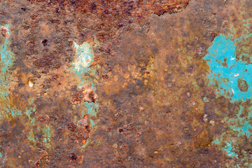 A background of peeling paint and rusty old metal