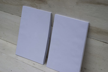 Mock-up magazine and catalog, cover for your design. Most realistic covers on wood background.