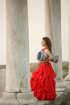 Bellydancer little girl dancing outdoors