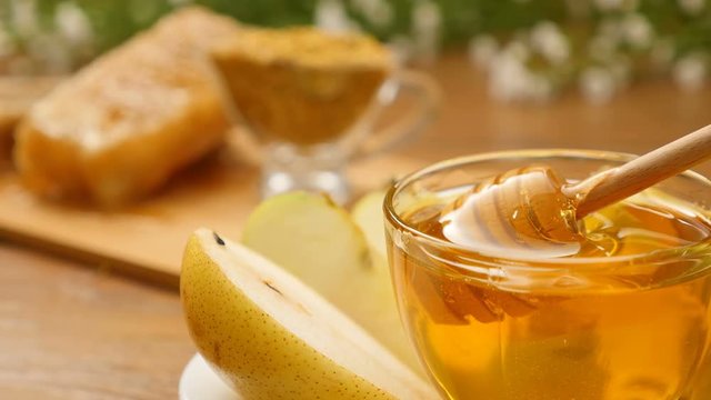 Honey pouring on pear from the honeyspoon (No 11.5)
