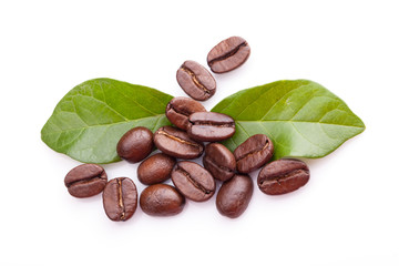 coffee grains and leaves on white background