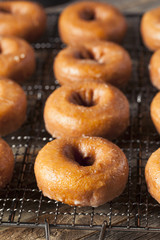 Homemade Glazed Autumn Pumpkin Donuts