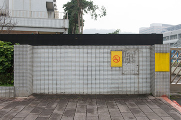 Large blank billboard on a street wall, banners with room to add your own text