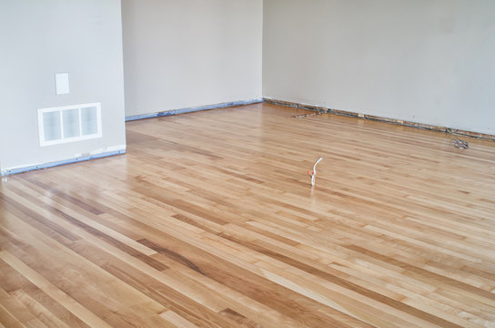 Home renovation with newly varnished hardwood floor