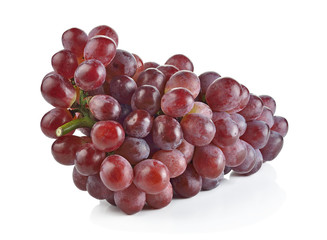 A cluster of red grapes isolated on white background