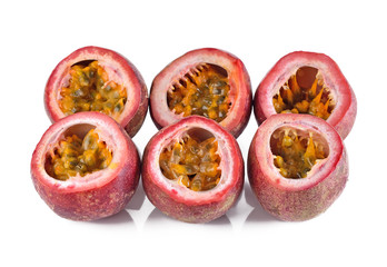 passion fruit , cut open on white
