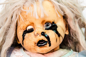 Close up of scary baby doll of halloween © parinyatk